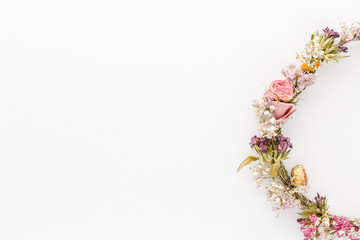 Minimal style photography. Dry flowers circle , natural creative composition top view background with copy space for your text. Flat lay.