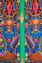 Repainting the entrance door of Phra Chetuphon Wimon Mangkararam Temple Or the Thai people call Wat Pho, an ancient temple in Bangkok, Thailand