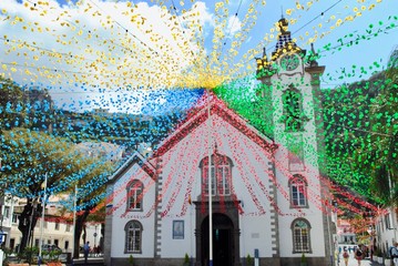 Ribeira Brava, Madeira, Portugal, Igreja de Sao Bento church is decorated with flowers looking like a flower explosion. This church is near the sea on this small island.