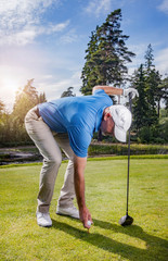 Man playing golf