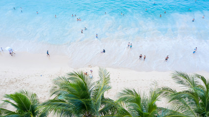 Surin beach in Phuket, southern of Thailand, Surin beach is a very famous tourist destination in Phuket, Beautiful beach. View of nice tropical beach with palms around. Holiday and vacation concept.