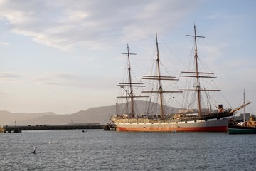 Fototapeta na wymiar A old sailing ship at Hyde Street Pier in San Francisco, California.