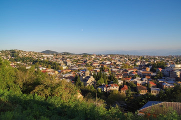Fototapeta premium Evening Kutaisi. Scenic view from the courtyard Bagrati Cathedral. Georgia, Imereti region, Kutaisi, Ukimerioni Hill