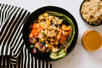 Plant-Based Buddha Bowl with Quinoa and Peanut Sauce