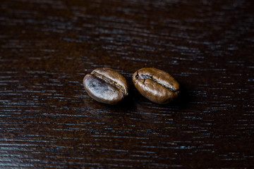 coffee beans on wooden background
