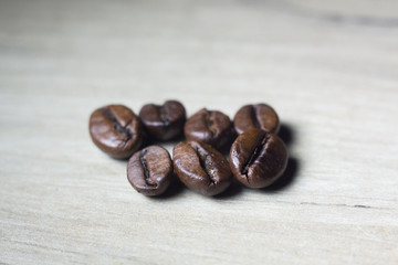 coffee beans on wooden background