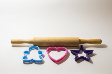 rolling pin and figures for cookies
