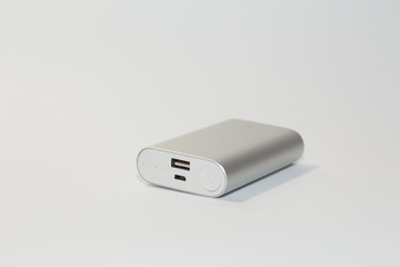 Fototapeta premium gray power bank on a white background