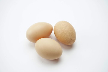Chicken eggs isolated on a light background