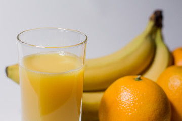 multivitamin juice near fruits