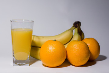 multivitamin juice near fruits