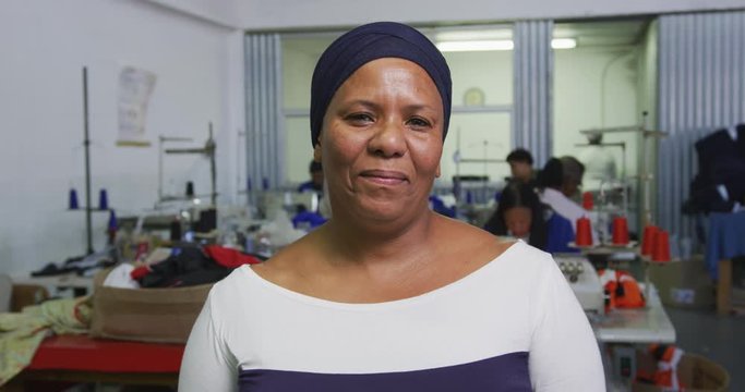 Front view of mixed race worker in factory