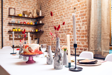 Festive cake in red on banquet table. restaurant interior decor