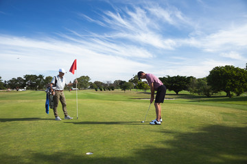 Golfers playing golf