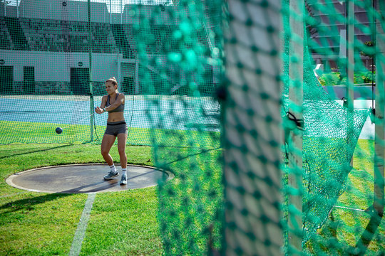 Athlete training in shot put
