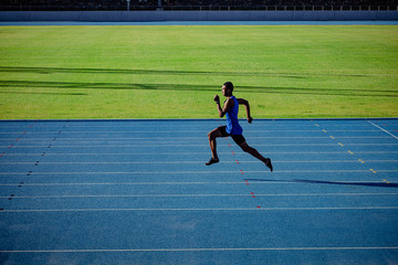 Athlete running at the stadium