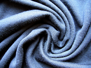Blue fabric close-up. The texture of the fabric. Blended fabric.