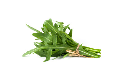 fresh arugula leaves on white background