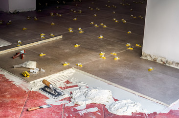 tiles on the floor with tools