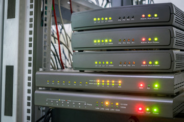 Equipment for Internet connection works in computer racks. Several digital communication gateways are in the server room. Telephone voice routers are in the data center.