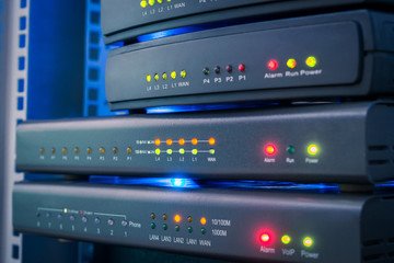 Telephone voice routers are in the data center. Equipment for Internet connection works in computer...