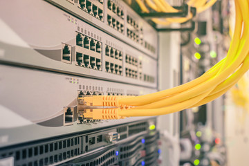 A bunch of Internet wires connected to the interfaces of computing equipment. Information...