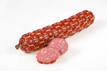 Tasty meat sausages over white background