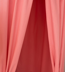 Draped with waves lightweight semitransparent fabric coral color
