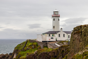 Fototapeta na wymiar Fanad Head Lighthouse was conceived as essential to seafarers following a tragedy which happened over 200 years ago. In December 1811 the frigate “Saldanha” sought shelter from a storm. 