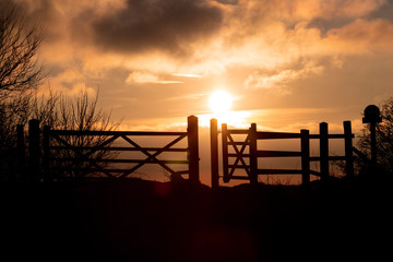 Obraz premium Sunset behind Gate