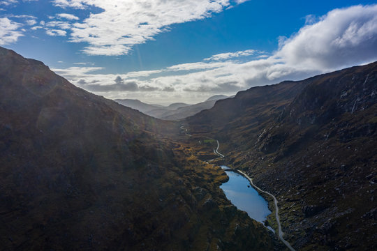 The Gap of Dunloe is a narrow mountain pass running north-south in County Kerry, Ireland, that separates the MacGillycuddy's Reeks mountain range in the west, from the Purple Mountain Group range.