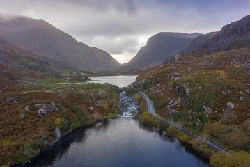 The Gap of Dunloe is a narrow mountain pass running north-south in County Kerry, Ireland, that separates the MacGillycuddy's Reeks mountain range in the west, from the Purple Mountain Group range.