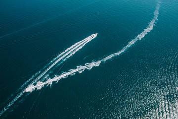 Aerial Drone flying shot of cruise motorboat and jetski. Adriatic Sea, Croatia, Europe