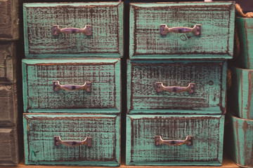 Vintage colored and toned wooden drawers background