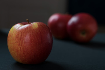 Fototapeta na wymiar red apples close-up on a dark background