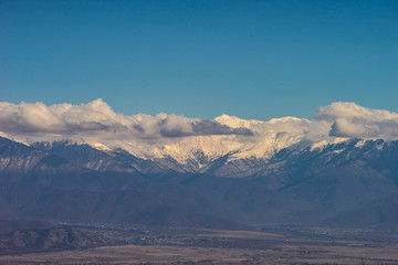 Plakat Kakheti valley and Greater Caucasus mountain in spring