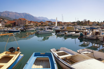Beautiful Mediterranean landscape.  Montenegro, Adriatic Sea, Bay of Kotor. View of Marina Kalimanj in Tivat city and  mountain of Lovcen