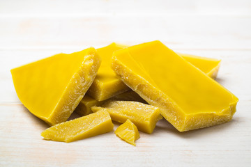 The pieces of natural beeswax.