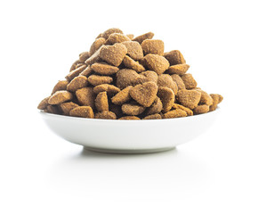 Dried kibble pet food. Heart shape dried animal food.