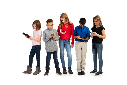 Kids: Modern Youth Using Digital Tablets And Cell Phones