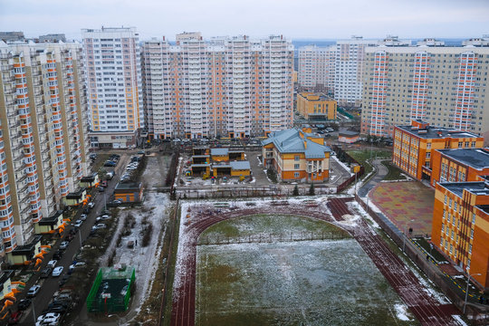 Moscow, Russia - February, 19, 2020: image of a new residential area in Moscow and a playground in the yard
