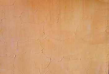 Yellow grunge cement wall, textured damaged background
