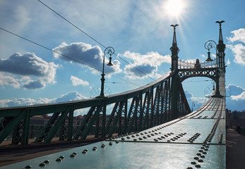 Liberty bridge in strong backlight in Budapest. The hungarian name is Szabadsag hid, this is the shortest bridge of Budapest in Hungary.