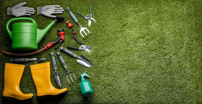 Various Gardening Tools Laying On Grass