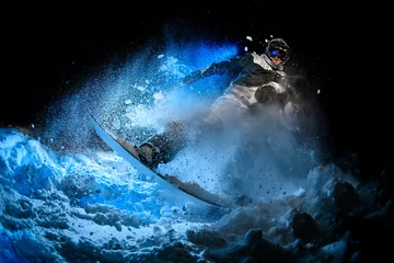 Poster Male freerider doing stunts in night time in mountains © fesenko