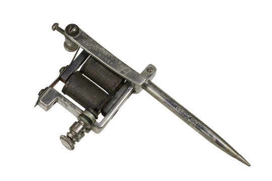Old tattoo machine isolated on white