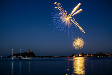 Fireworks over the sea of Nora bay, Sardinia