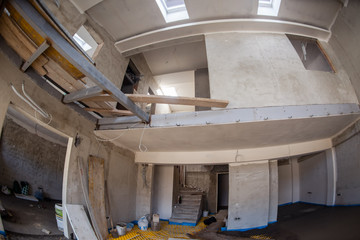 yellow underfloor heating installation with white pipes