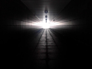 light at the end of an underpass tunnel