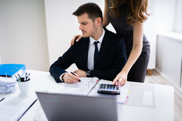 Businesswoman Flirting In Office